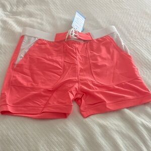 Vibrant Coral Athletic Shorts with White Waistband